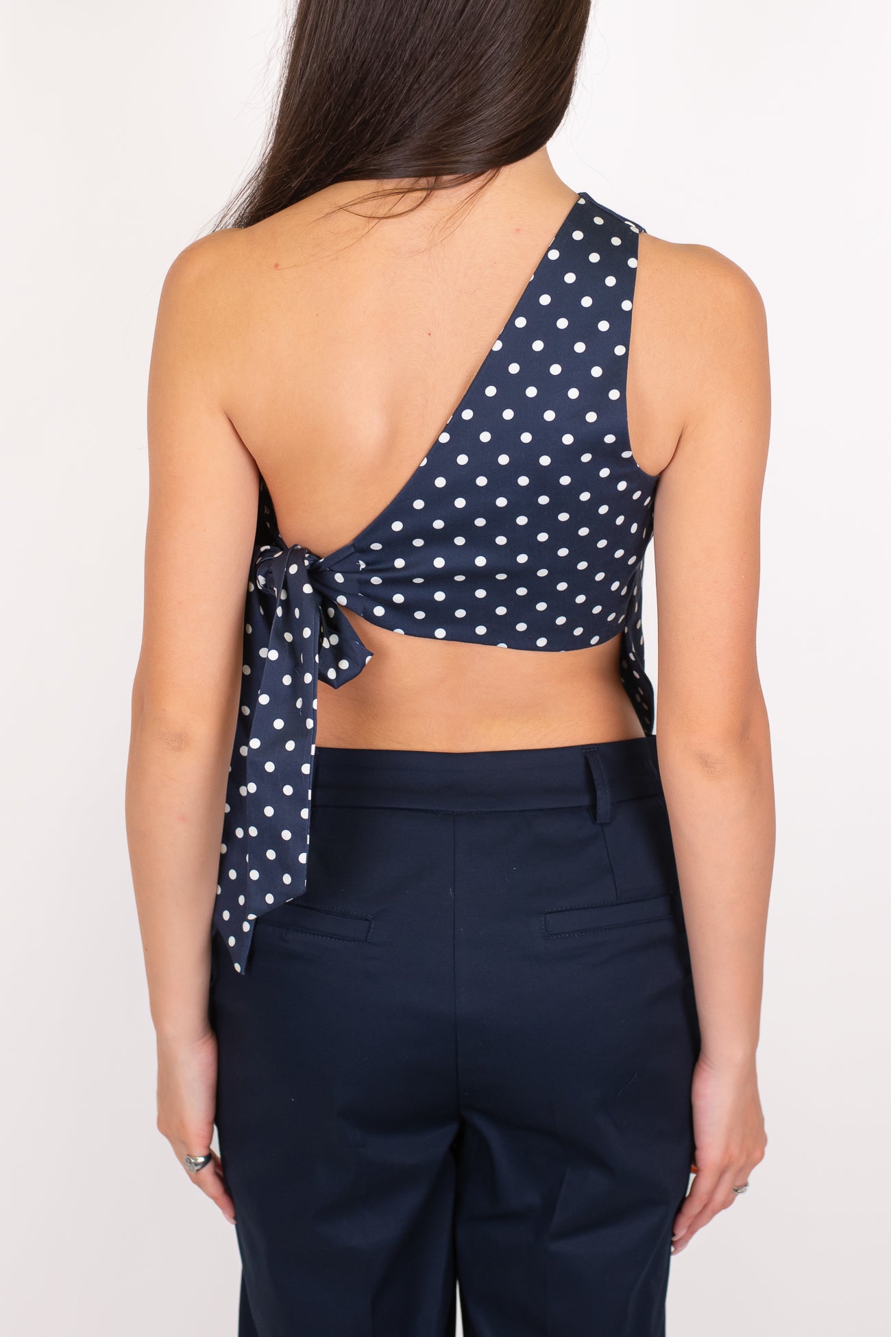 Dixie - Top monospalla fantasia pois con fiocco sul retro