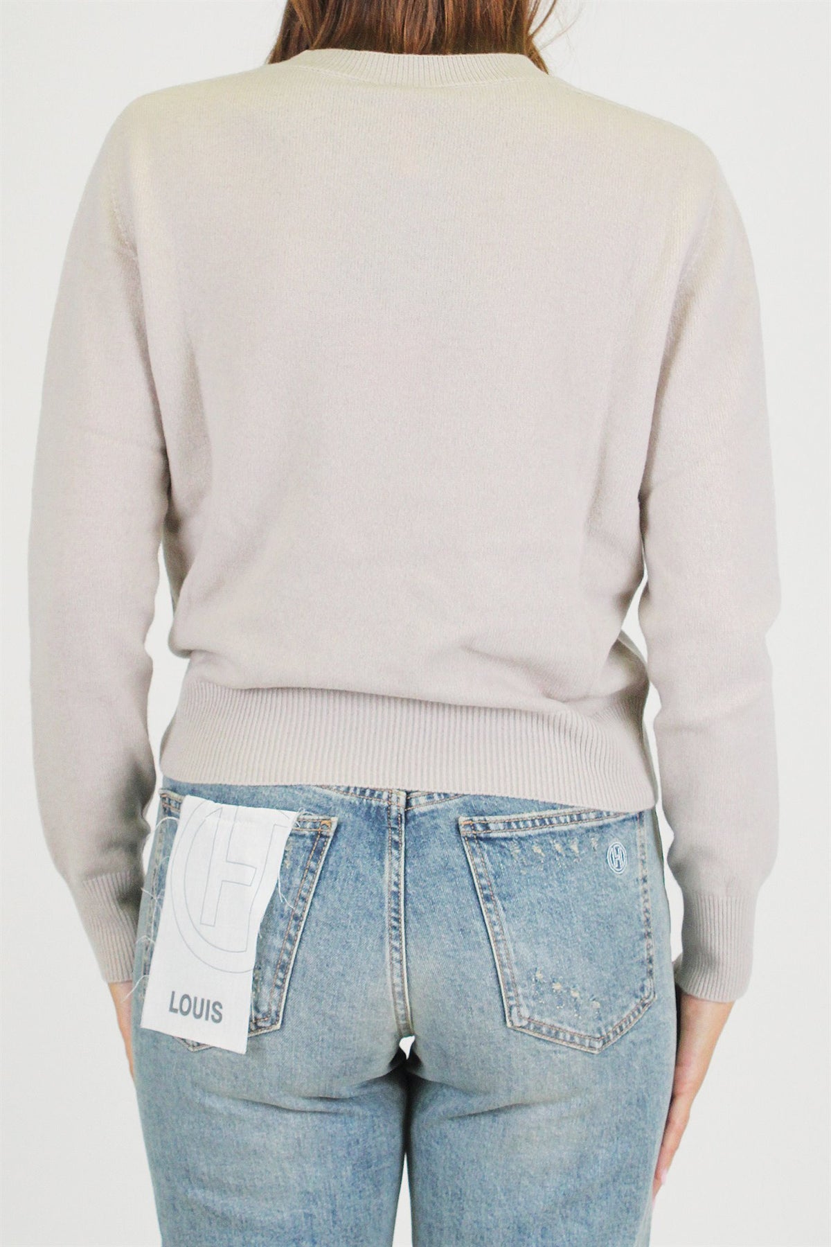 Tensione in - Maglia scollo a V in pura lana