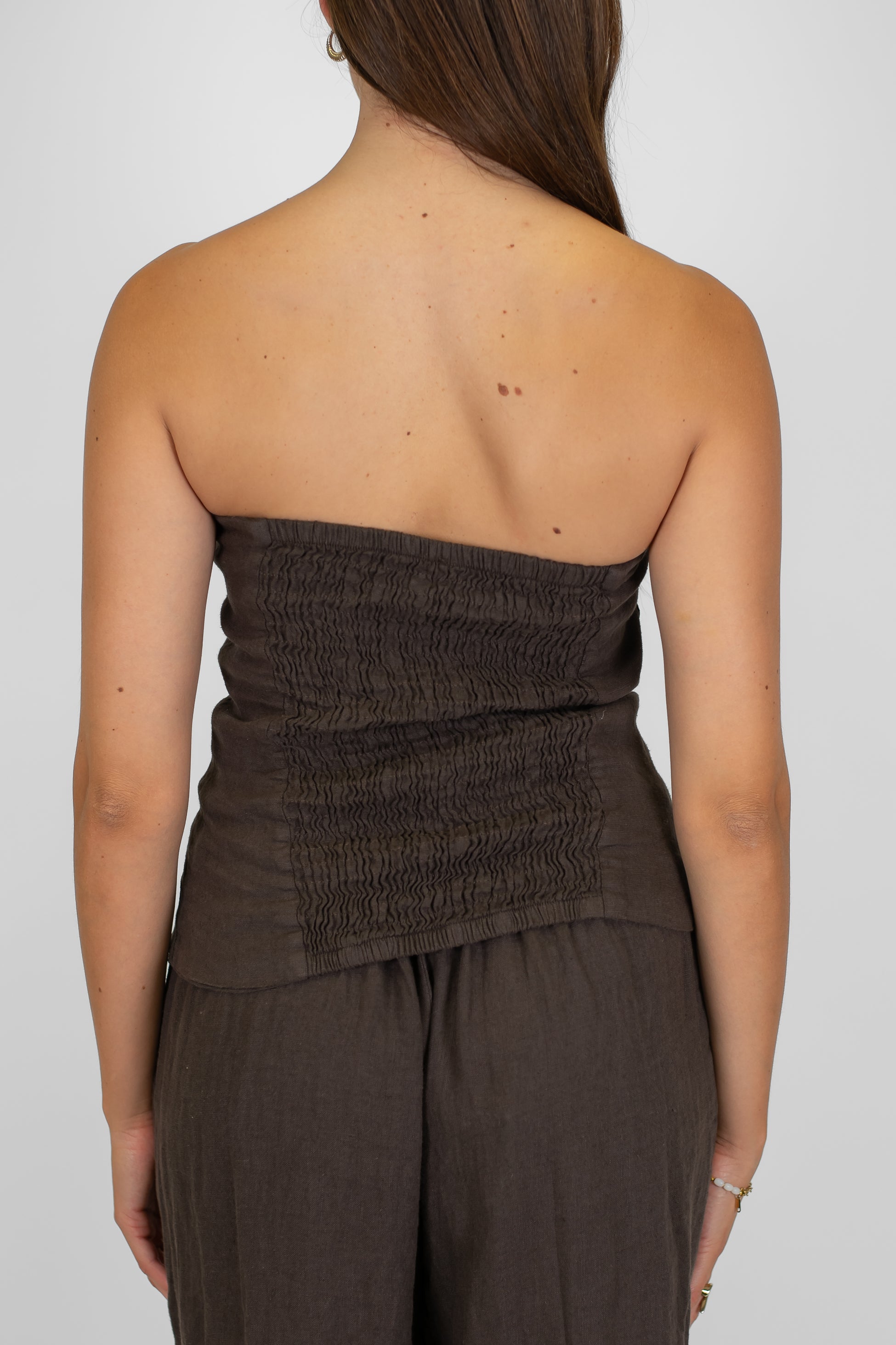 Tensione in - Top a fascia in puro lino