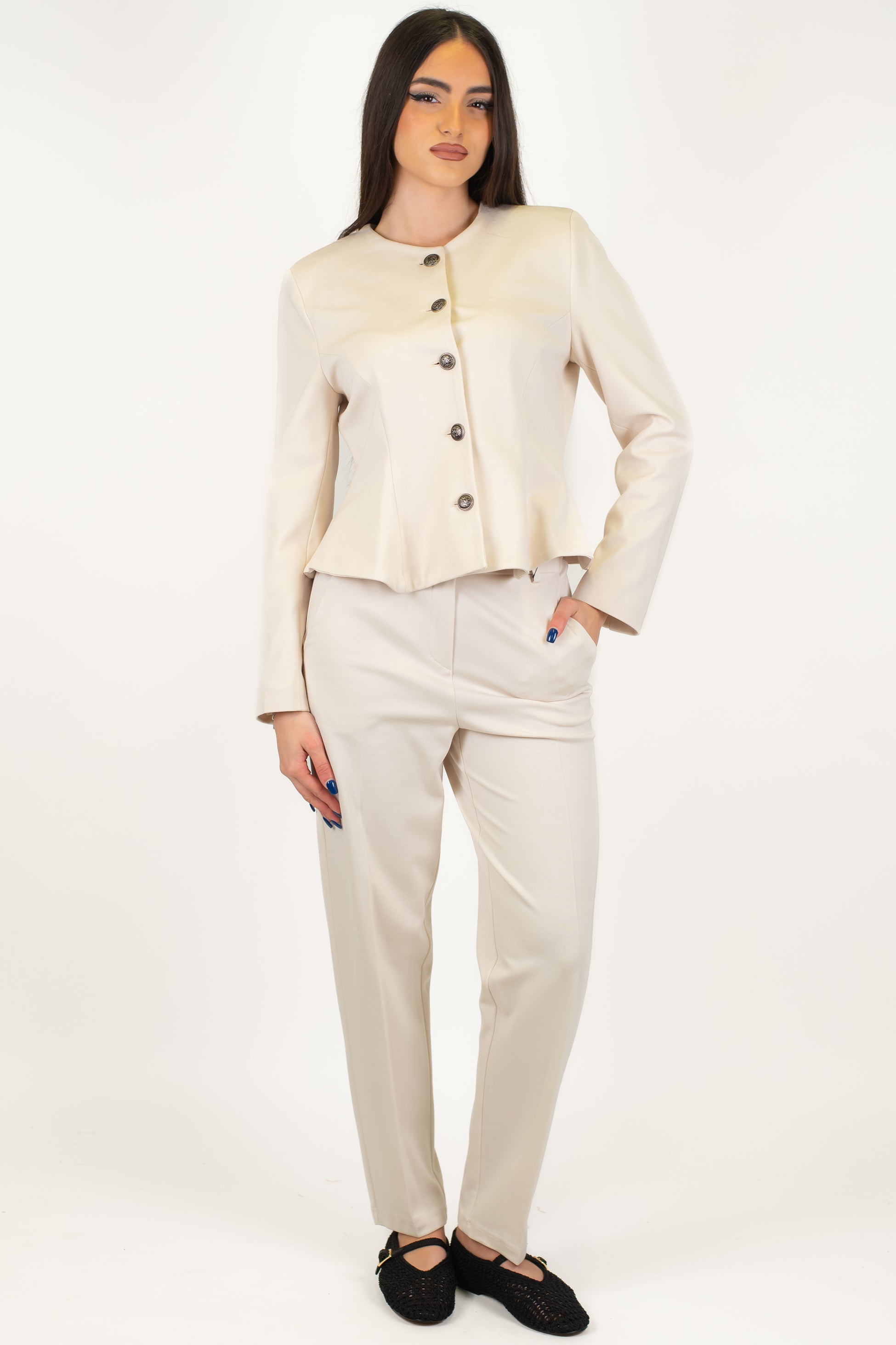 Tensione in - Pantalone slim in punto milano con elastico in vita