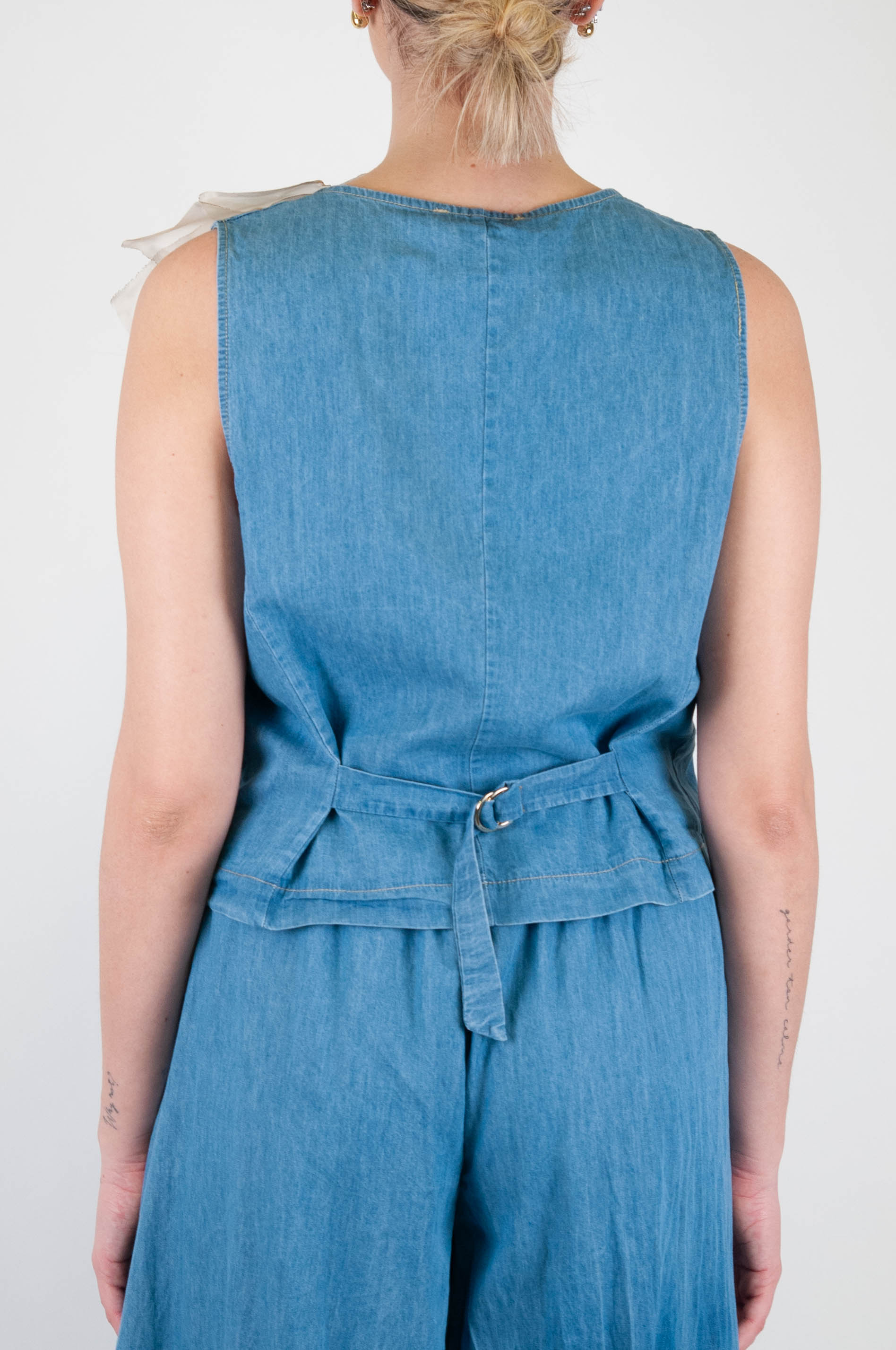 Motel - Chambray vest with flower brooch