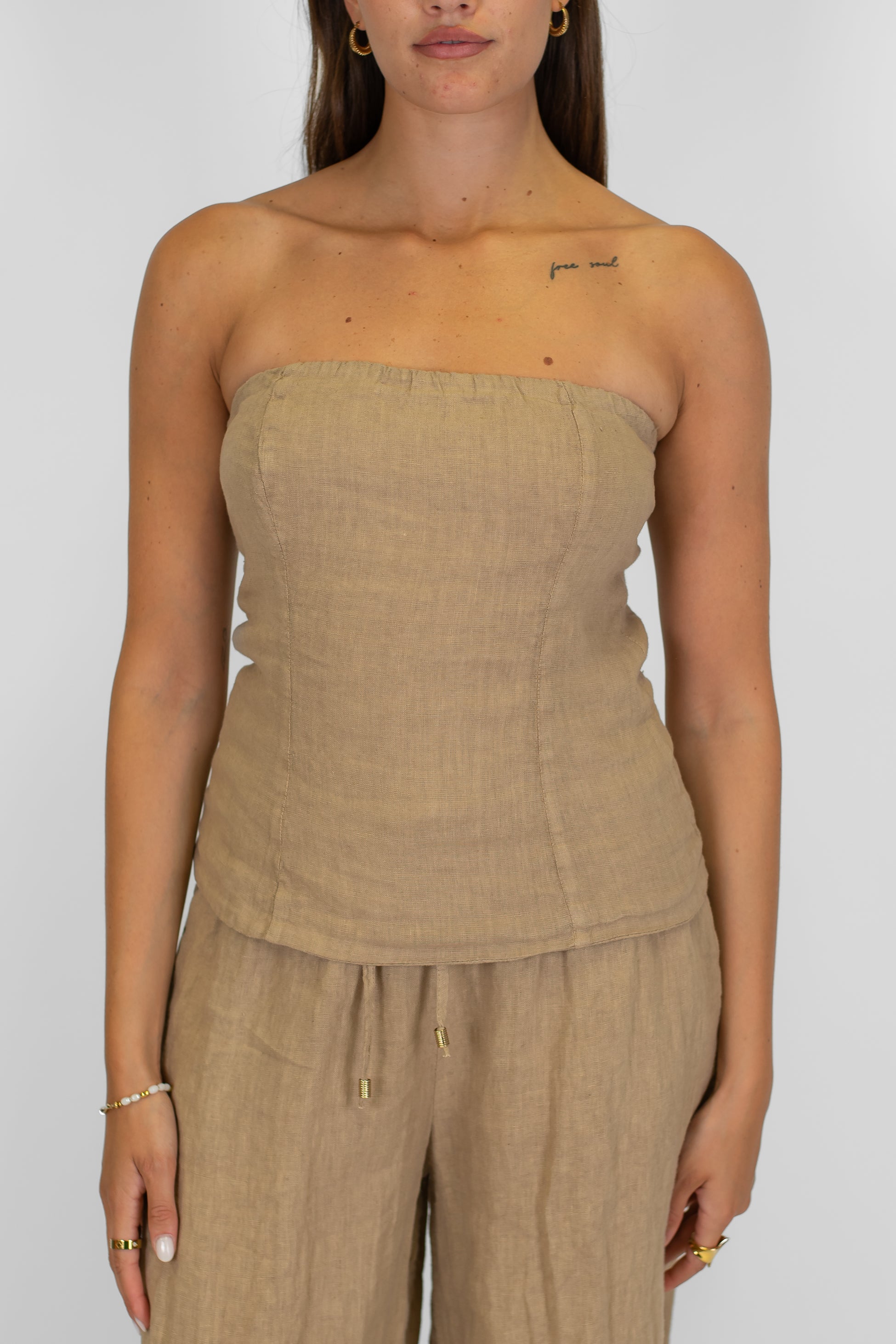 Tensione in - Top a fascia in puro lino