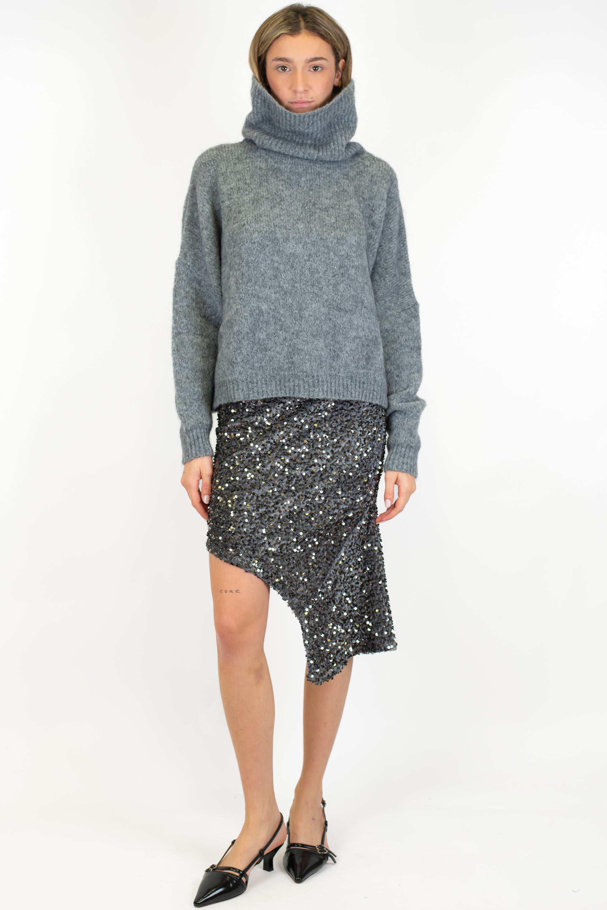 Tensione in - Minigonna asimmetrica in paillettes