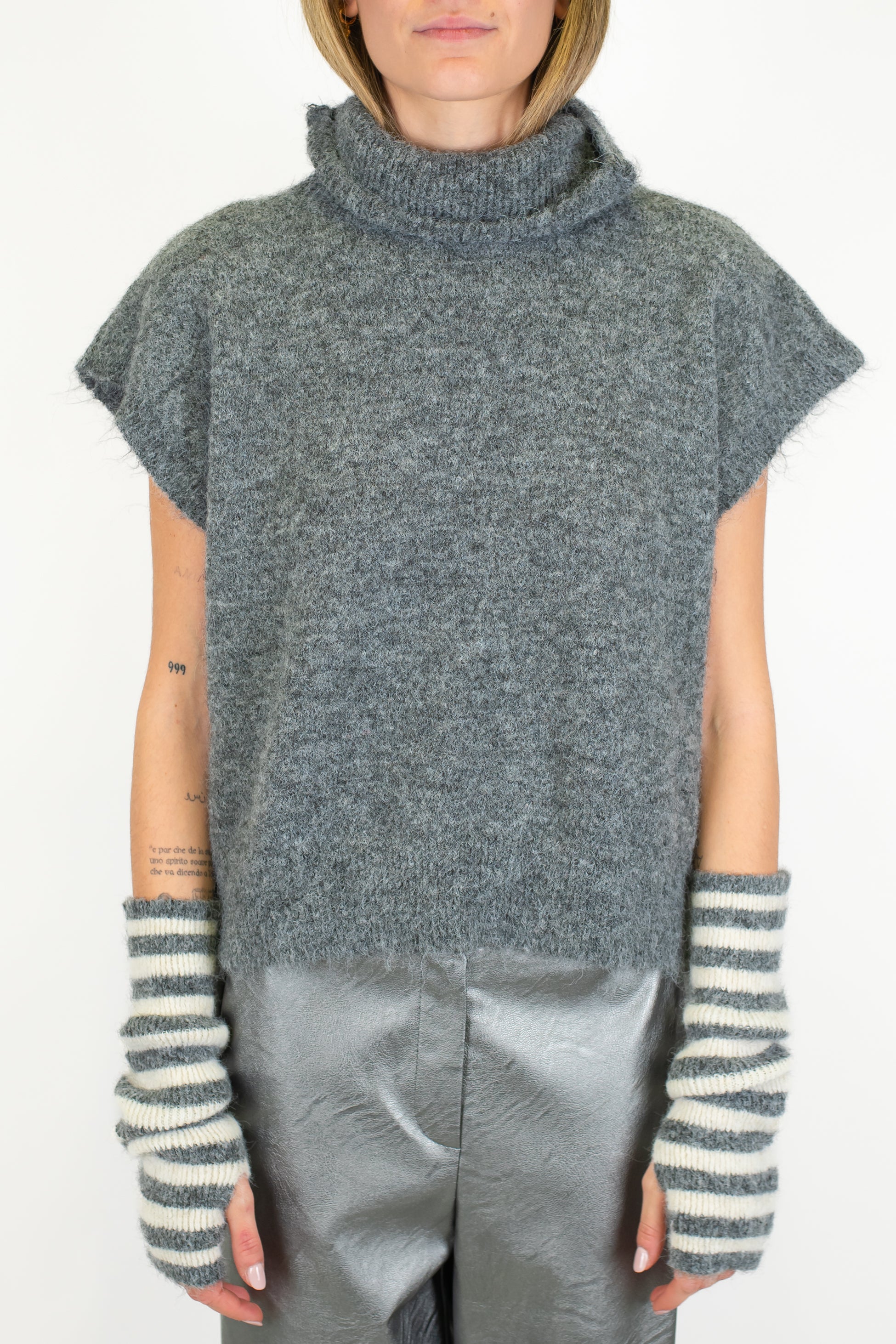 Tensione in - Dolcevita giromaniche in misto lana con manicotti fantasia a righe