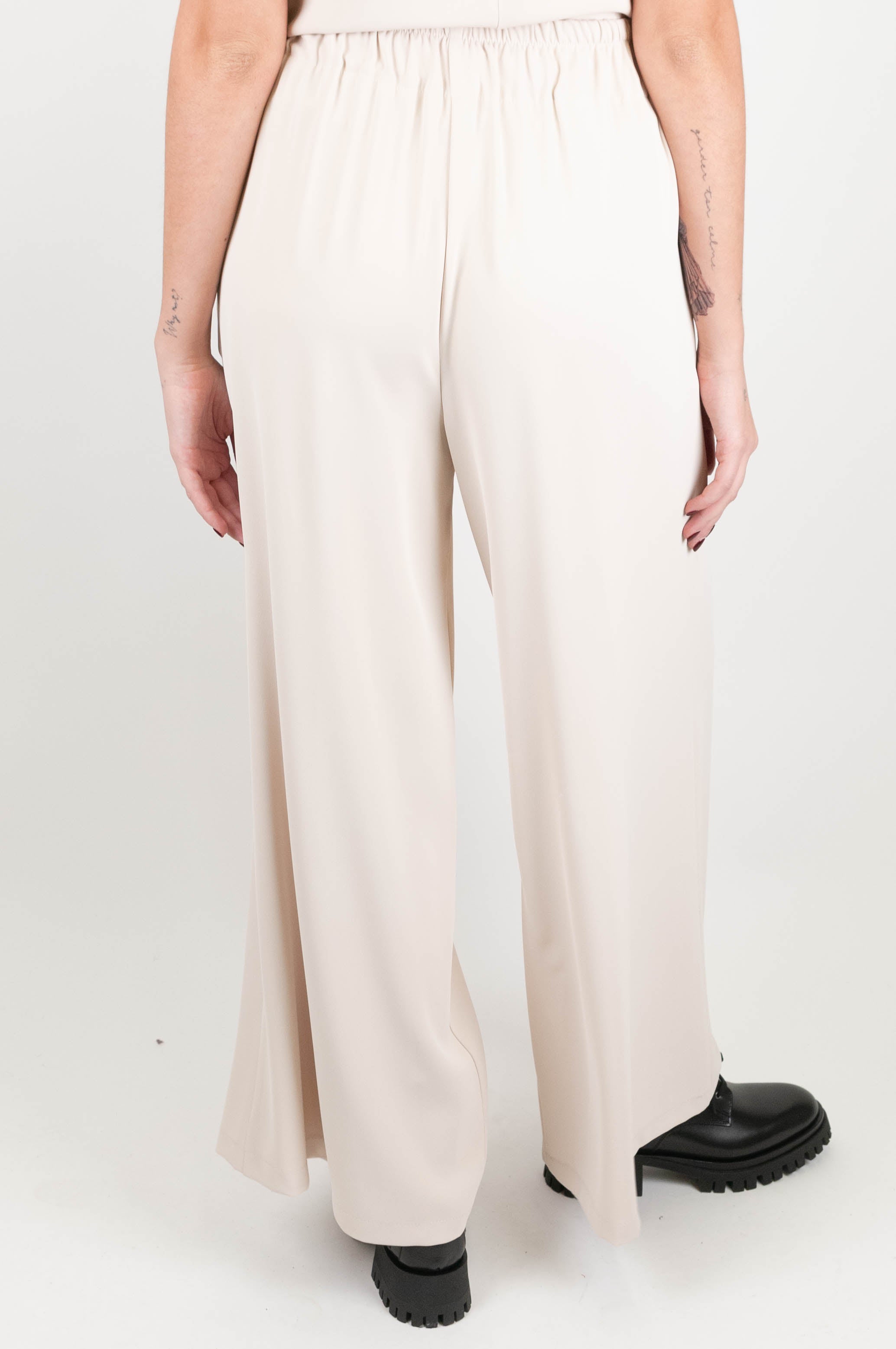 Tensione in - Pantalone palazzo con coullisse in tessuto crepe