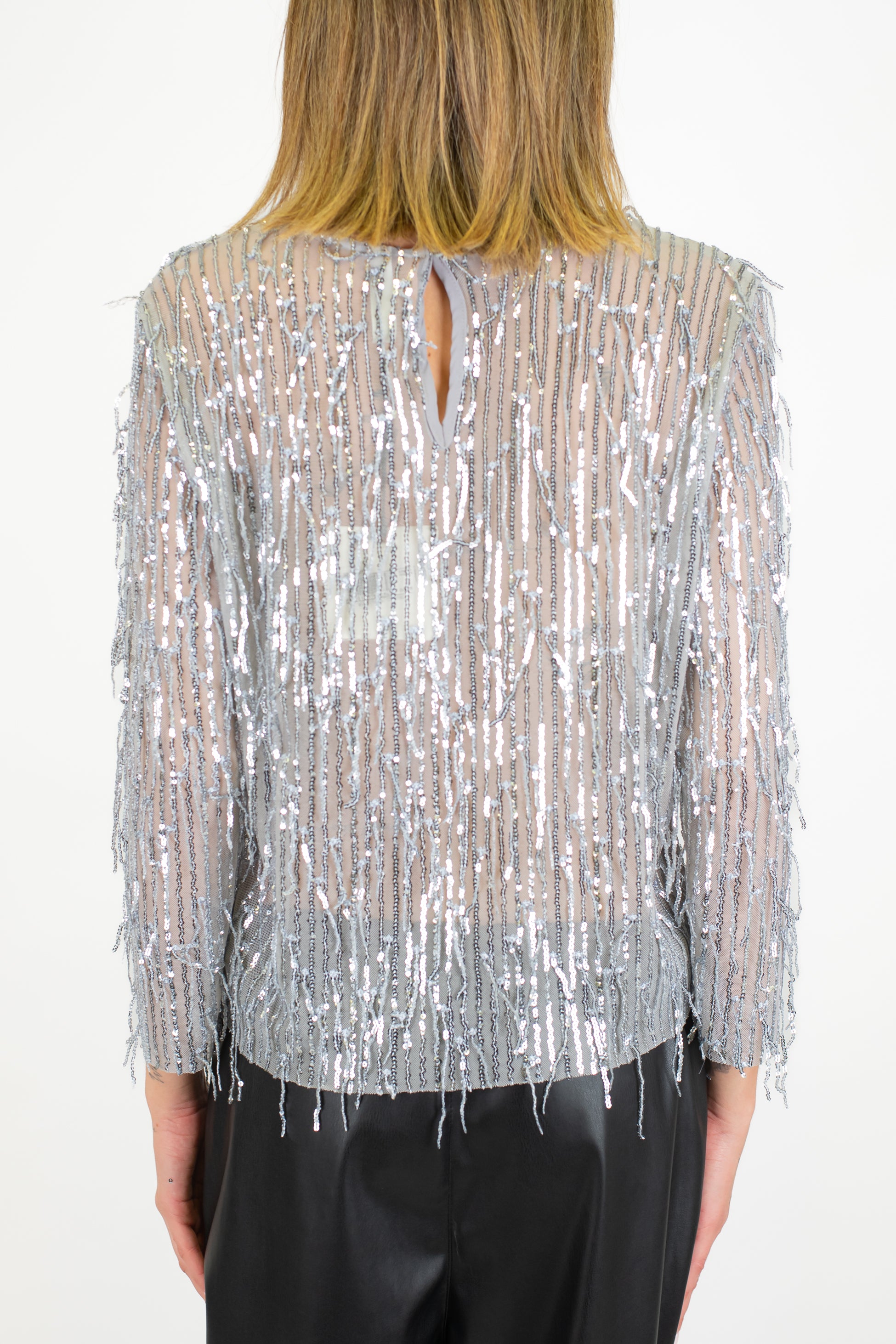 Tensione in - Blusa girocollo con frange paillettes