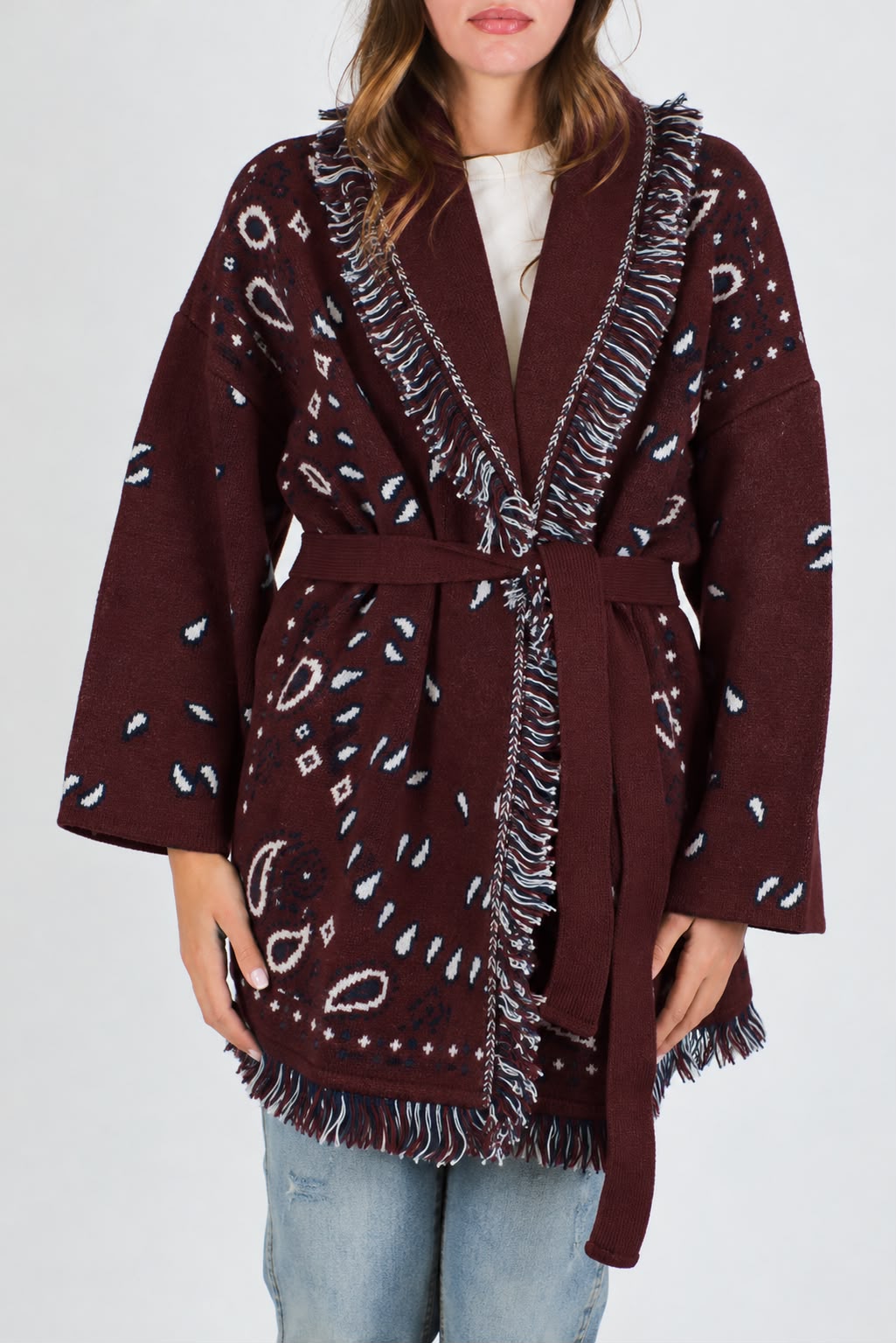 Tensione in - Cardigan fantasia bandana in misto lana con profilo frange e chiusura con cintura in tessuto