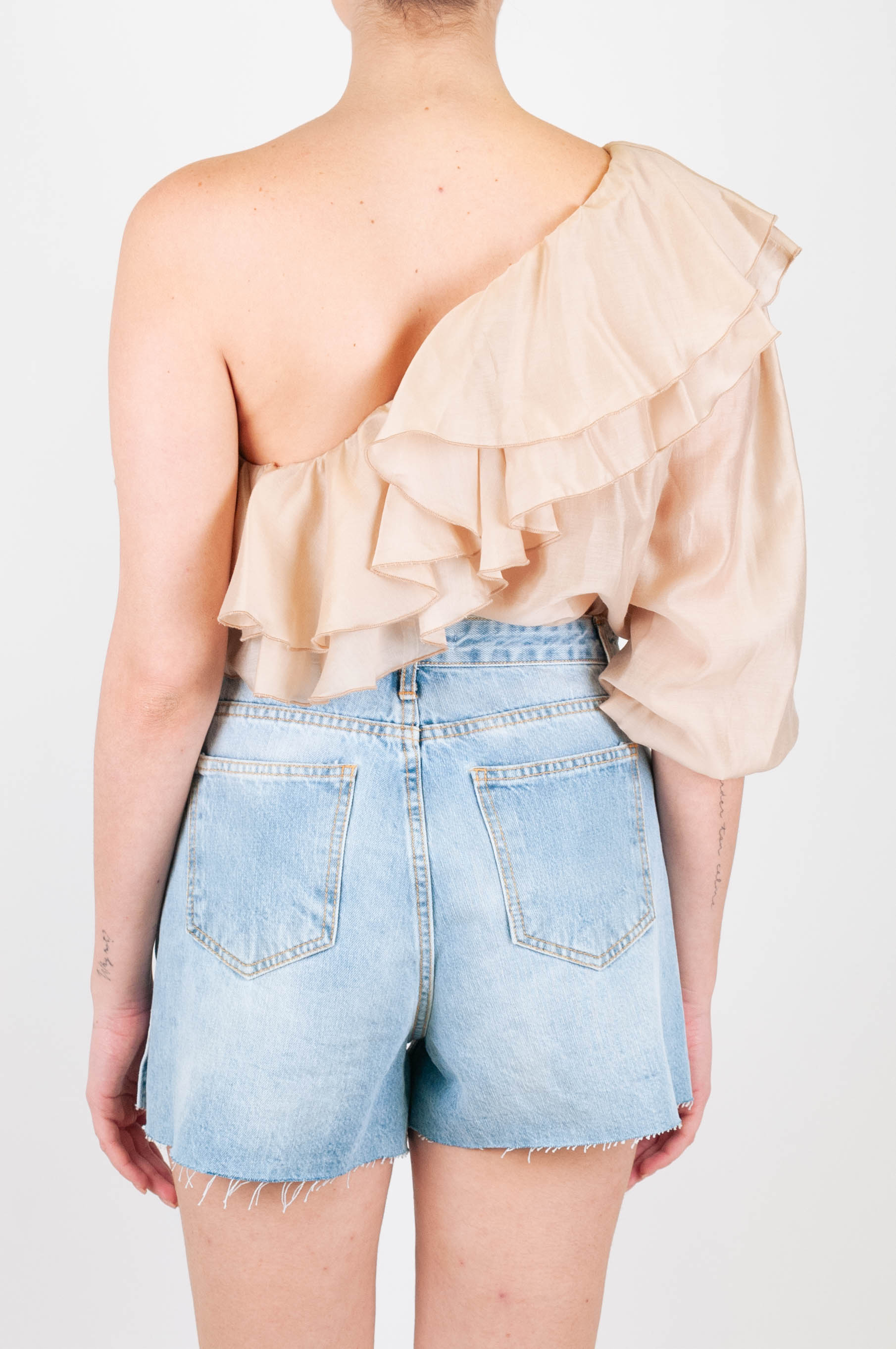 Tensione in - Blusa monospalla con rouches