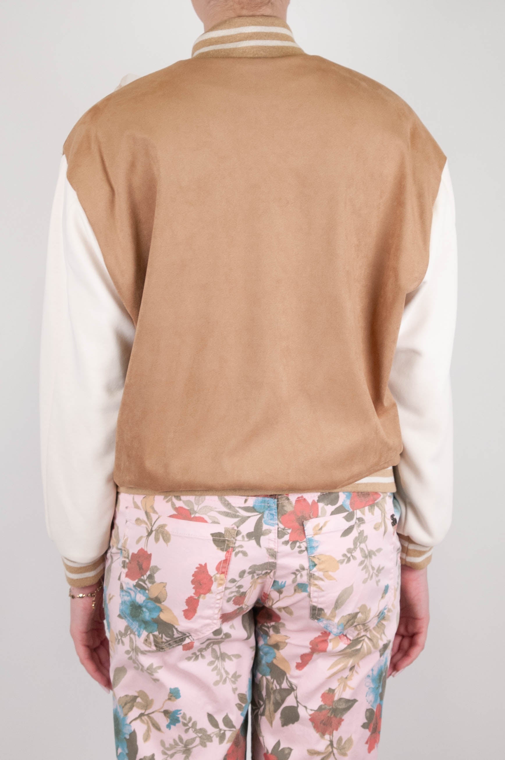 Tension in - Bomber jacket with contrasting sleeves and flower brooch