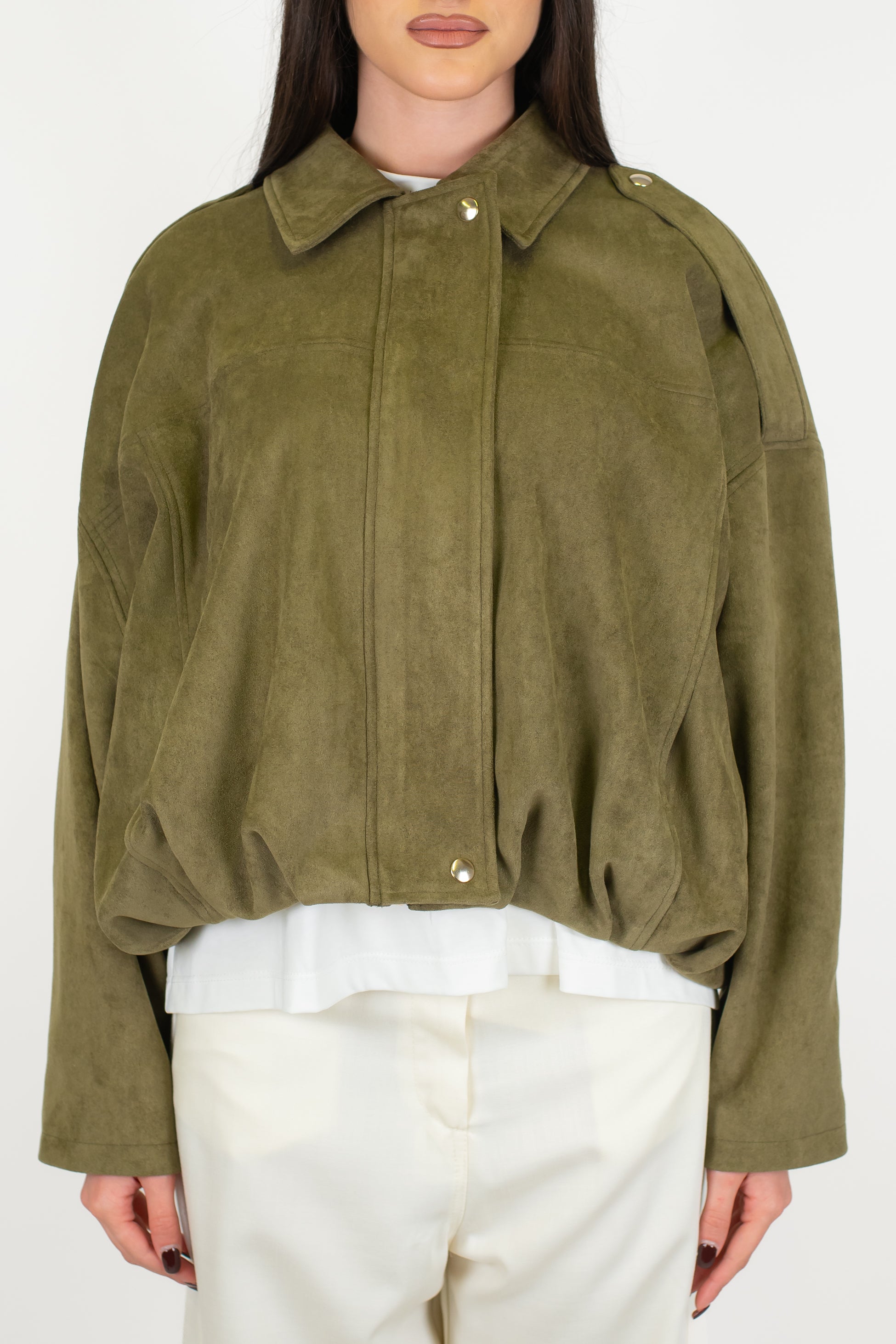 Tensione in -  Bomber over in dainetto con chiusura a scomparsa ed elastico sul fondo