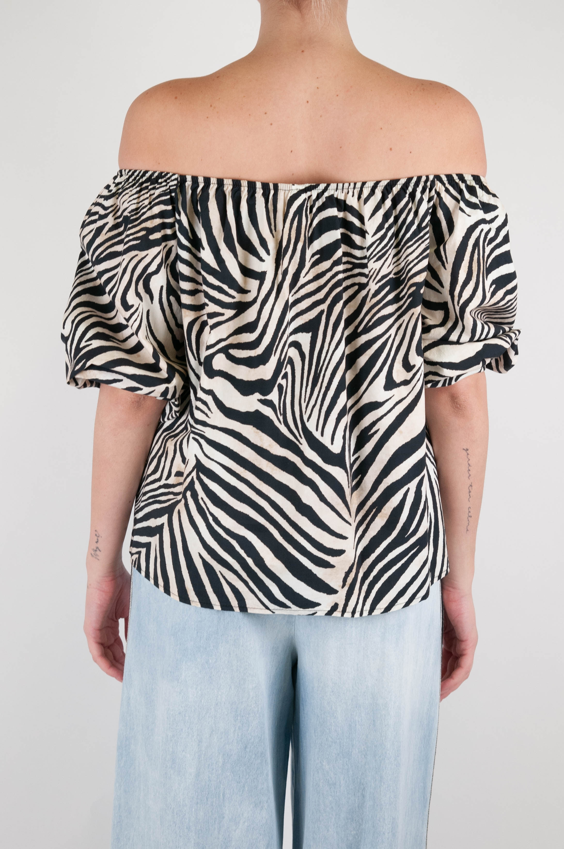 Tension in - Zebra animal print top with shiffer neckline