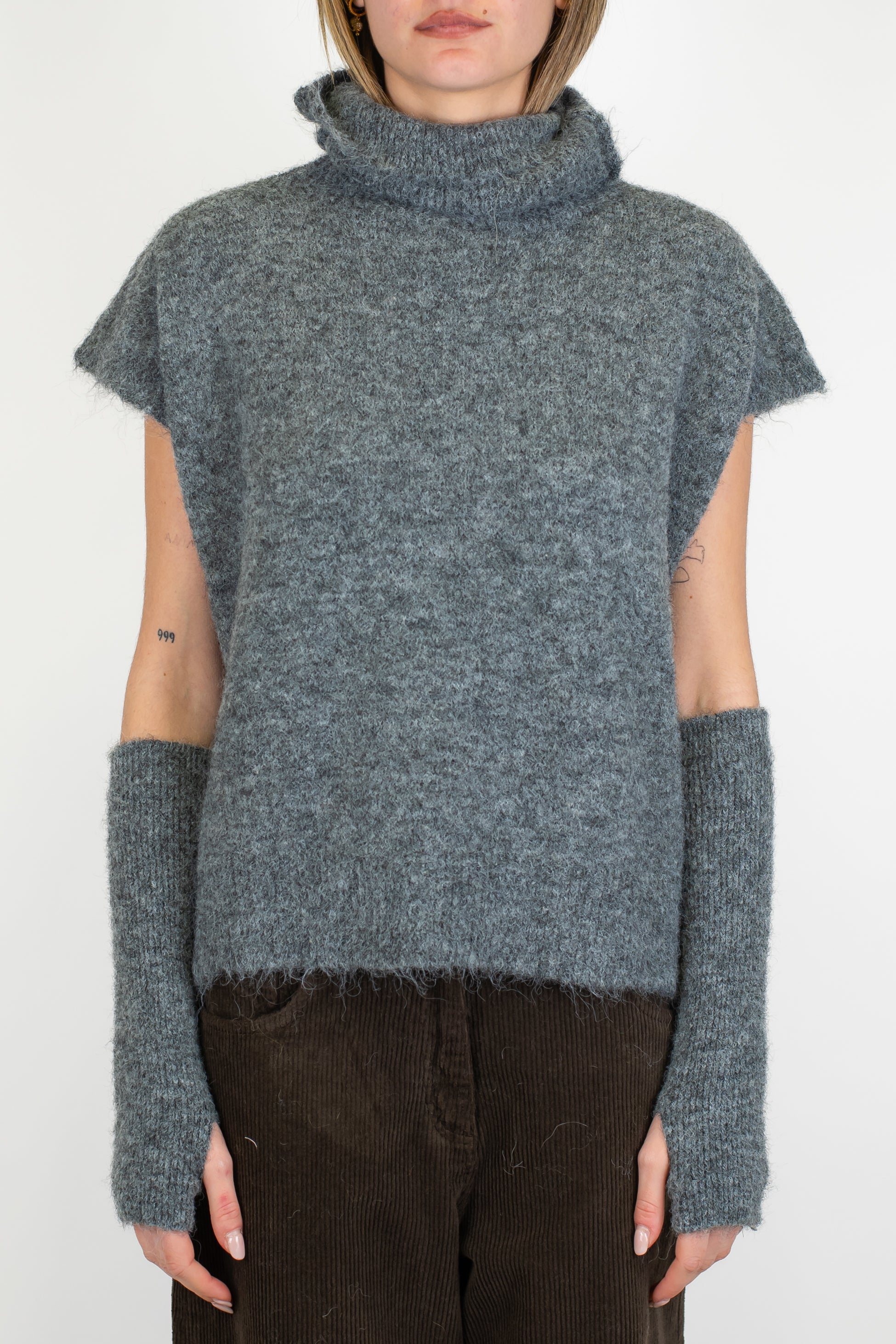 Tensione in - Dolvecita giromaniche in misto lana con manicotti