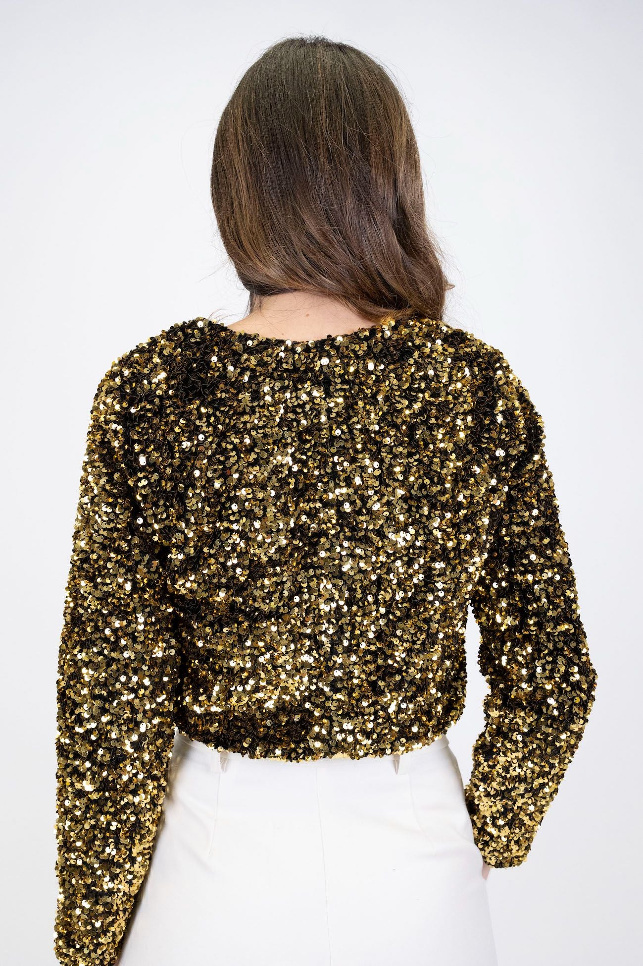 Tensione in - Blusa crop con paillettes