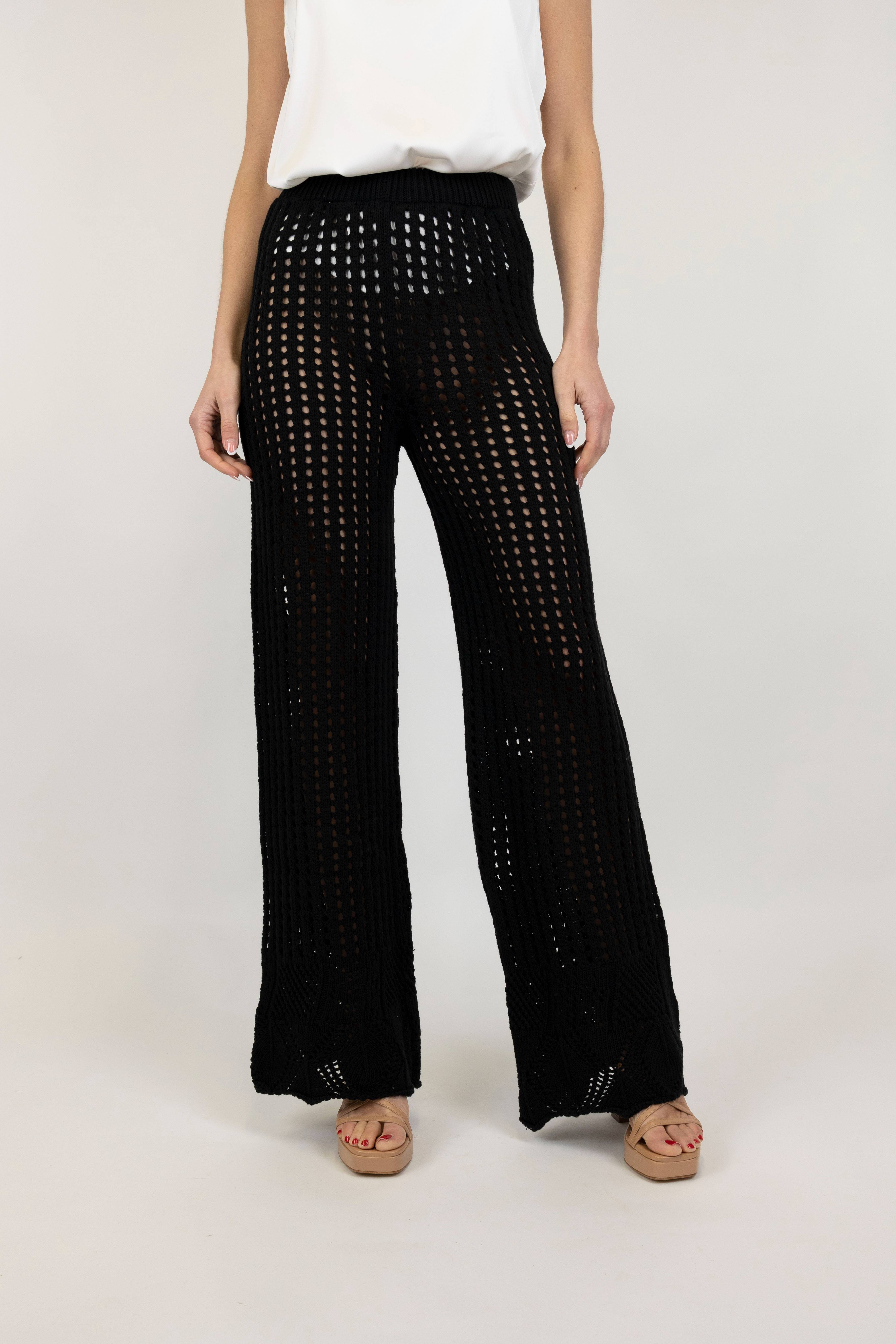 Tension in - Flared trousers with elastic waist and perforated embroidery